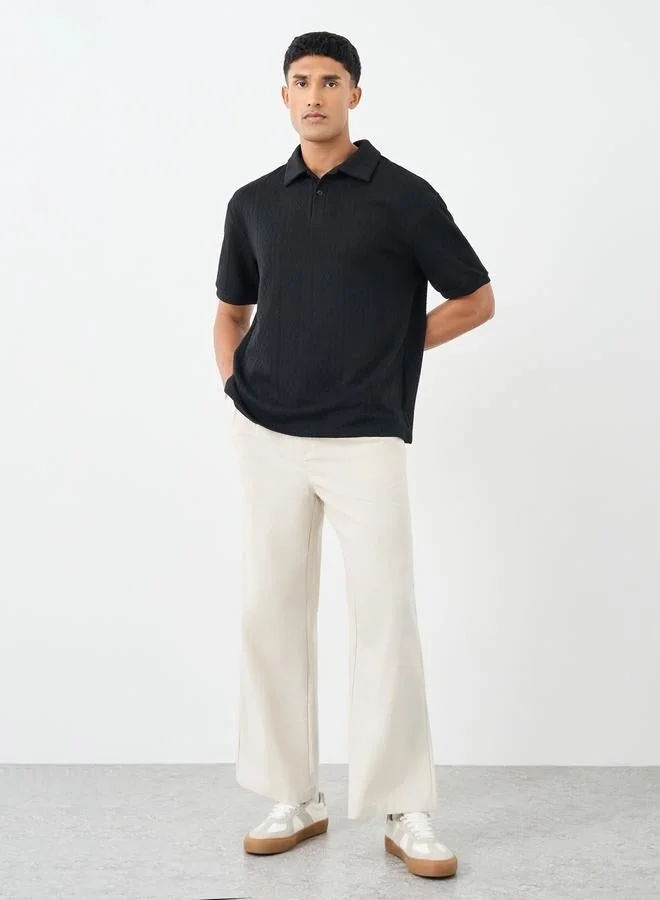 ستايلي ستايلي بولو كبير الحجم بياقة ريفير محبوك بنسيج كابل فاخر